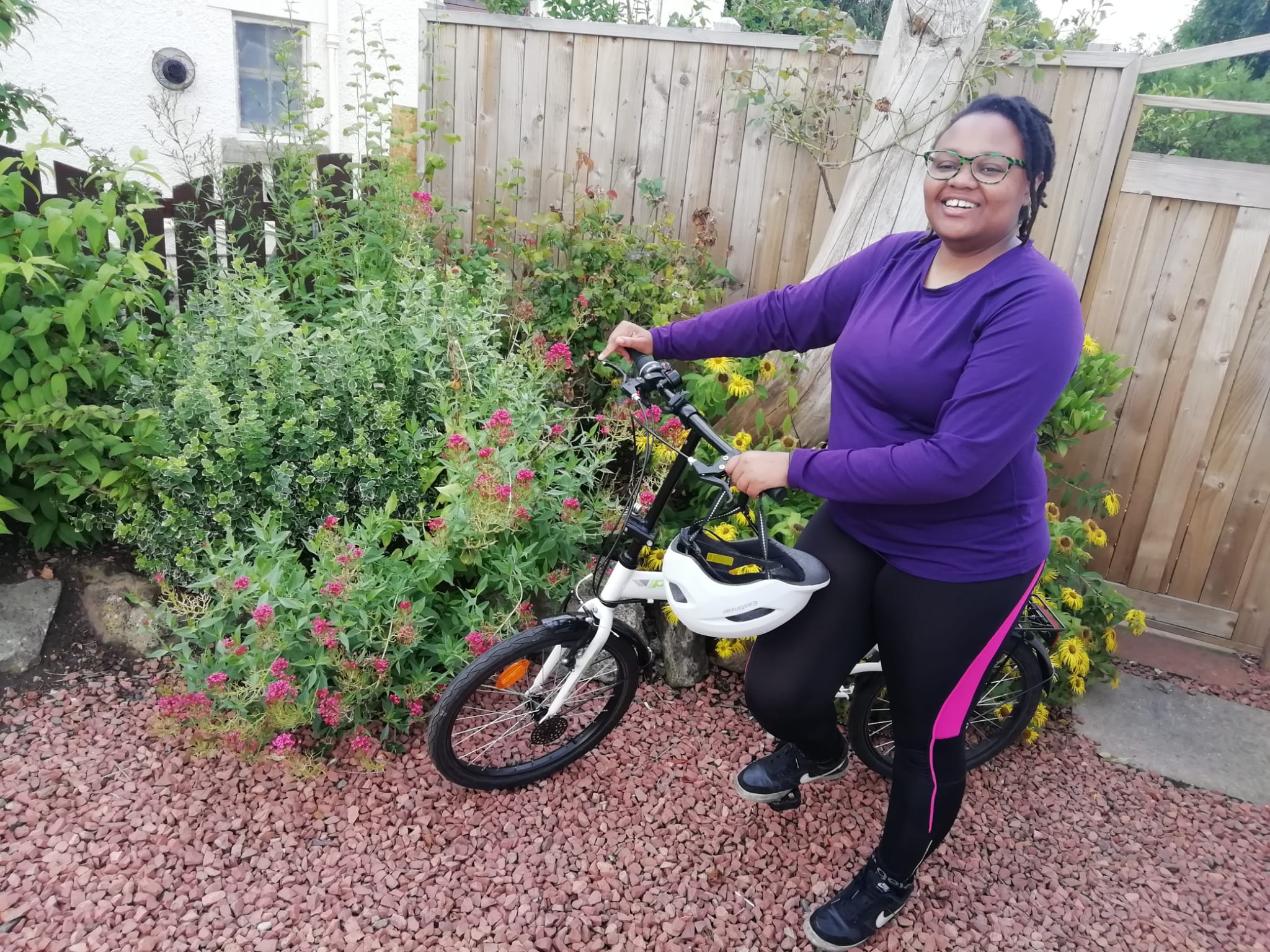 Asinath with her bike