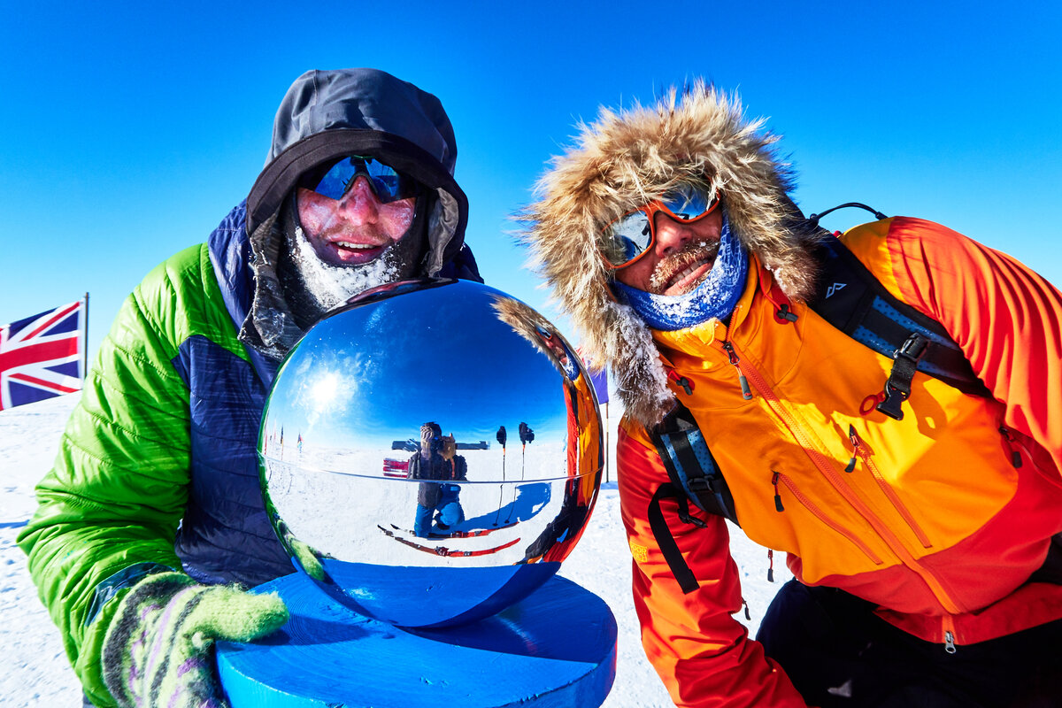ALE Guide and guest at Ceremonial South Pole