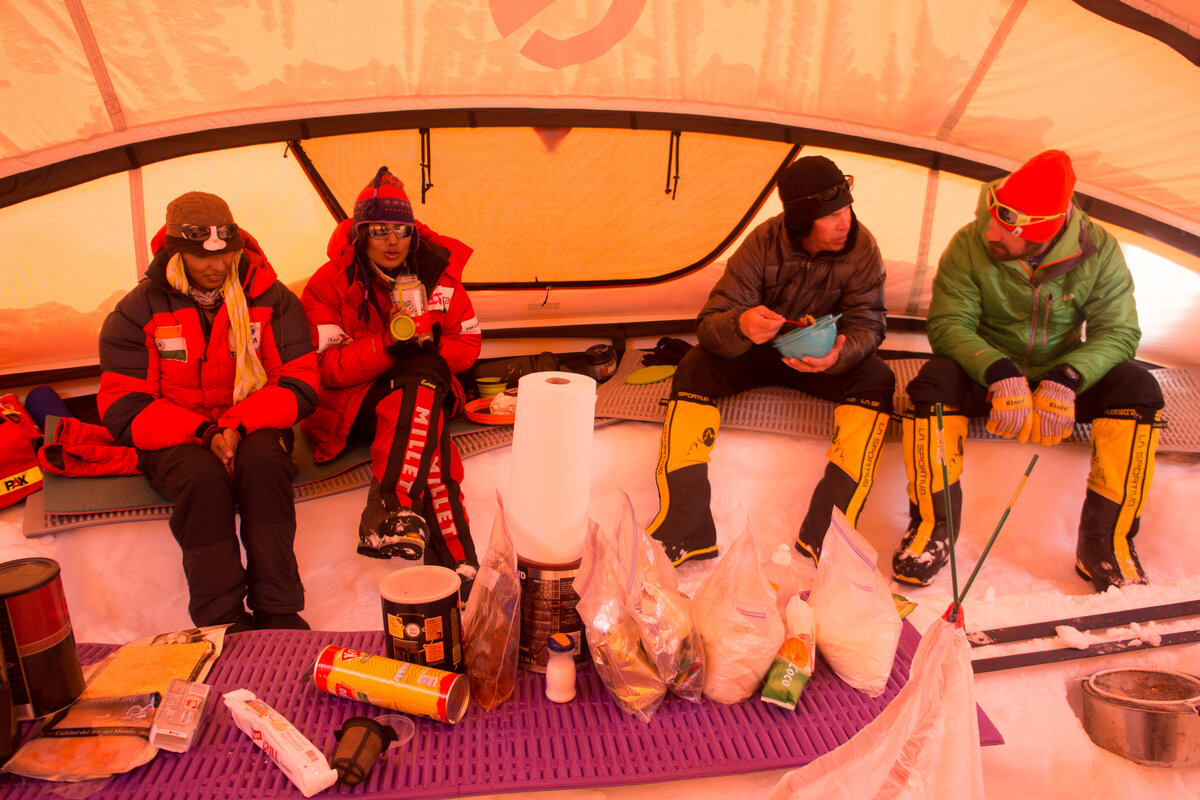 ALE guests enjoy a meal at Low Camp