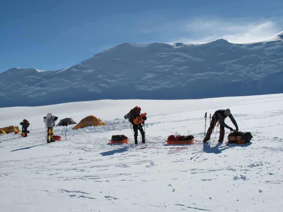 Roped climbers prepare to head out from Vinson Low Camp