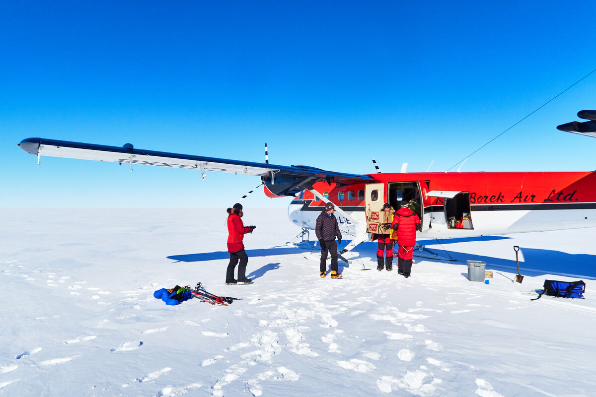 Unloading equipment from ALE Twin Otter at Messner Start